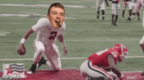 Football Player Number 2 Kneeling On Field GIF