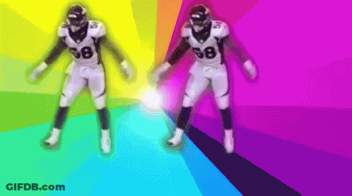 Football Player Number 2 Surrounded By Teammates GIF