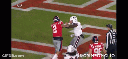Football Player Number 2 Tackled GIF