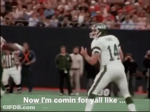 Football Player Number 20 Standing Next To Player GIF