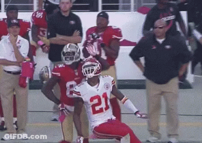Football Player Number 21 Kneeling GIF