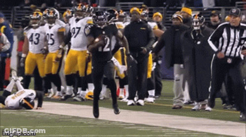 Football Player Number 21 Running Down Field GIF