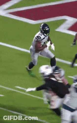 Football Player Number 21 Running On Field GIF