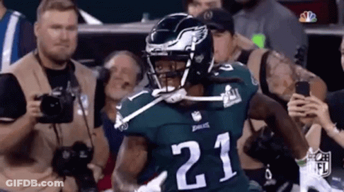 Football Player Number 21 Running On Field GIF