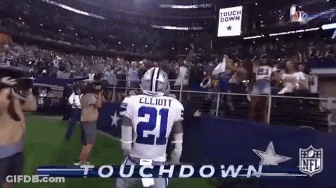 Football Player Number 21 Standing On Field GIF