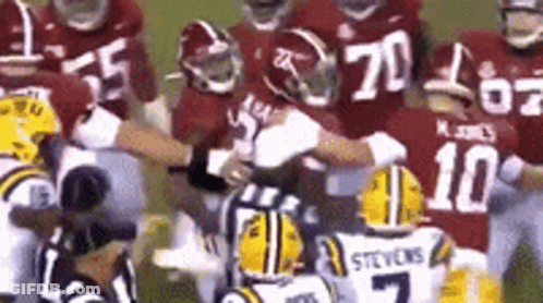 Football Player Number 22 Holding Football GIF