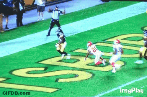 Football Player Number 22 Running On Field GIF