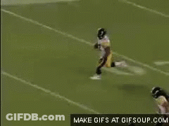 Football Player Number 22 Running On Field GIF