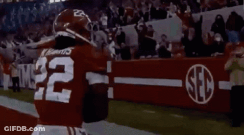 Football Player Number 22 Running With Ball GIF
