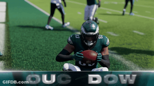 Football Player Number 23 Holding Football GIF