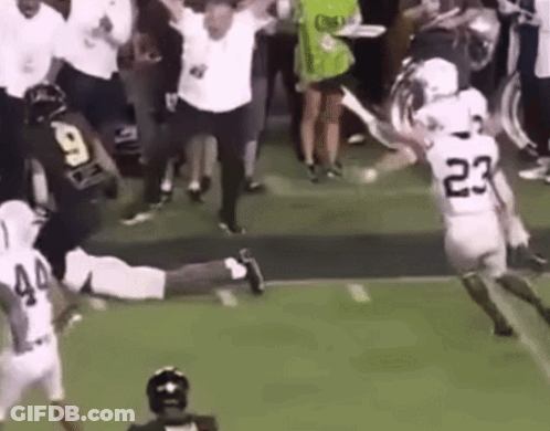 Football Player Number 23 Running On Field GIF