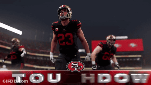 Football Player Number 23 Touchdown Banner GIF