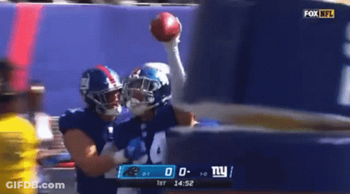 Football Player Number 24 Holding Football GIF