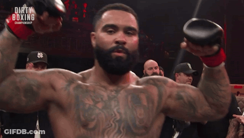 Football Player Number 24 Holding Helmet In Front Of Crowd GIF