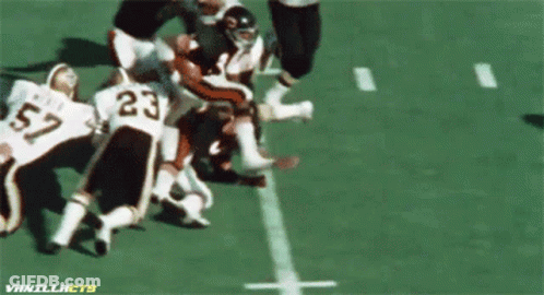 Football Player Number 24 Tackled GIF