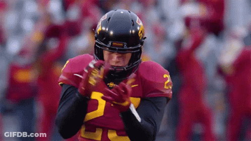 Football Player Number 25 With Helmet And Gloves GIF