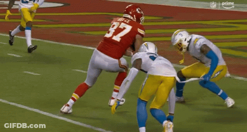Football Player Number 27 Being Tackled GIF