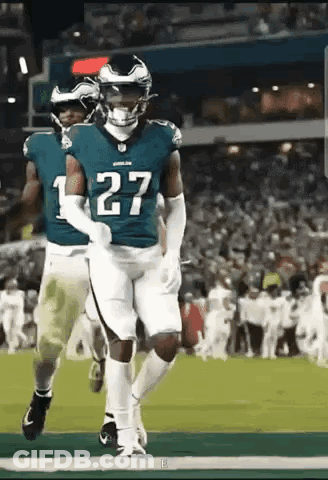 Football Player Number 27 Running GIF