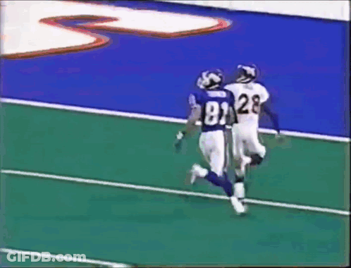 Football Player Number 28 Tackled GIF
