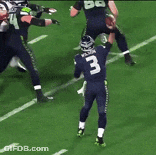 Football Player Number 3 About To Throw Ball GIF