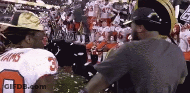 Football Player Number 3 In Front Of Crowd GIF