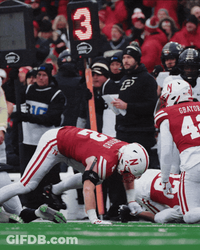 Football Player Number 3 Kneeling On Field GIF