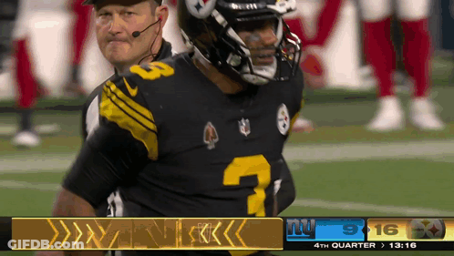 Football Player Number 3 Next To Referee GIF
