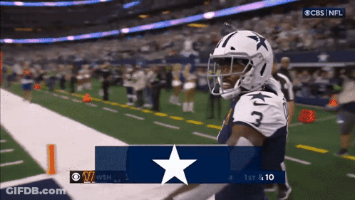 Football Player Number 3 On Helmet Standing On Field GIF
