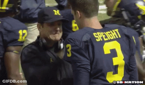 Football Player Number 3 Talking To Another GIF