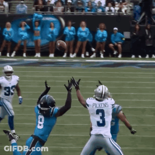 Football Player Number 3 Trying To Catch Ball GIF