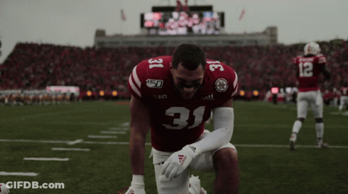 Football Player Number 31 Kneeling GIF