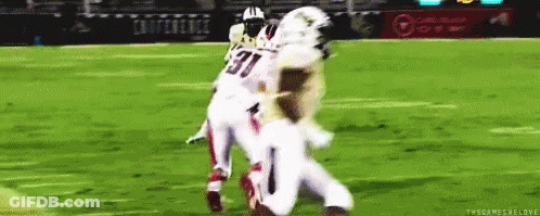 Football Player Number 31 Tackled GIF