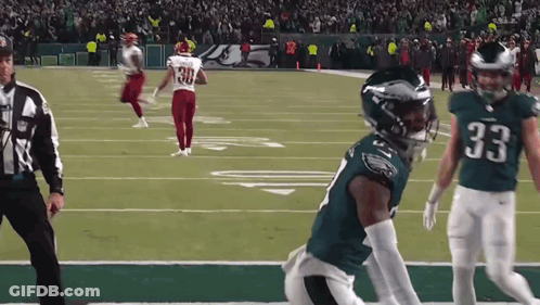 Football Player Number 33 Running On Field GIF