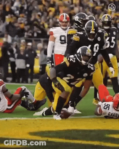 Football Player Number 35 Being Tackled GIF