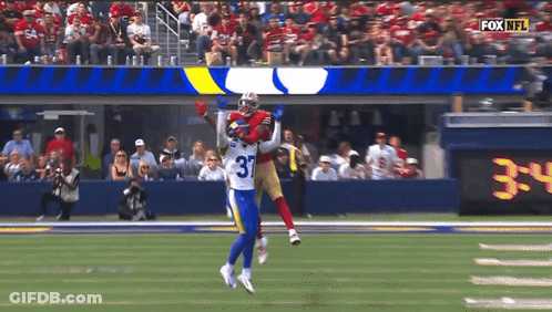 Football Player Number 35 Catching Ball GIF