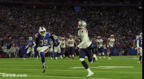 Football Player Number 39 Running On Field GIF