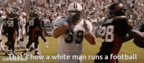 Football Player Number 39 Talking To Another Player GIF