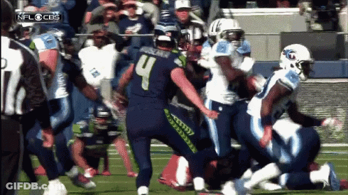 Football Player Number 4 Being Tackled GIF