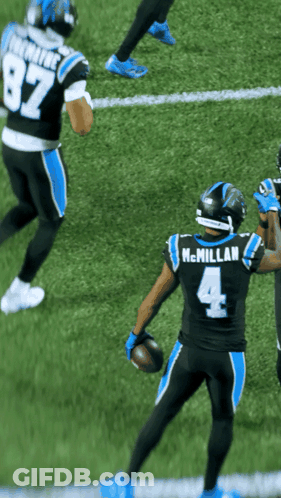 Football Player Number 4 Holding Football GIF