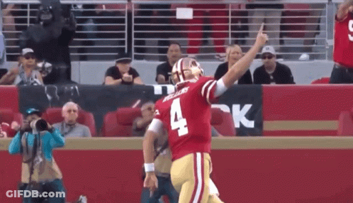Football Player Number 4 Running On Field GIF