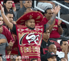 Football Player Number 4 Surrounded By Confetti GIF