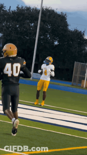 Football Player Number 40 Running On Field GIF
