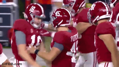 Football Player Number 45 Talking To Another Player GIF