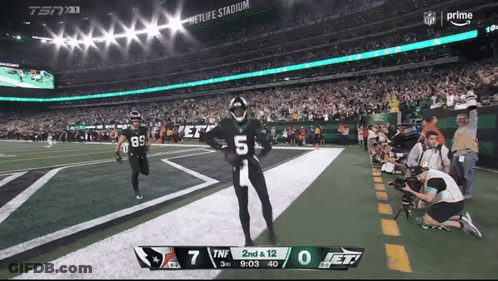 Football Player Number 45 Talking To Another Player GIF