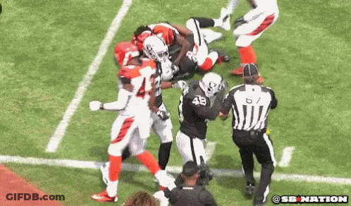 Football Player Number 48 Being Tackled GIF