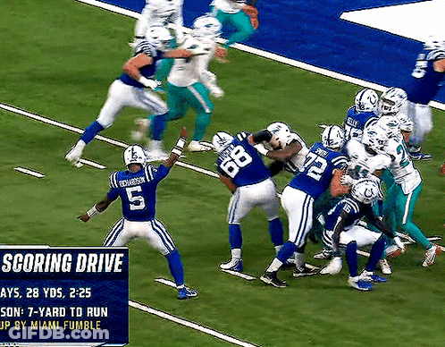 Football Player Number 5 Being Tackled GIF