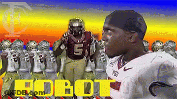Football Player Number 5 In Front Of Team GIF