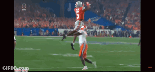 Football Player Number 5 Jumping In Air GIF