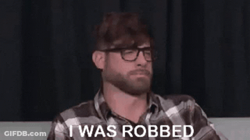Football Player Number 5 Surrounded By Players GIF