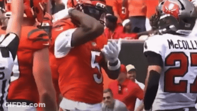 Football Player Number 5 Tackled By Number 27 GIF